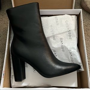 Black mid-calf booties